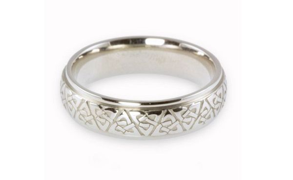 Celtic wedding rings symbolizing eternal love and loyalty - Wedding Clan