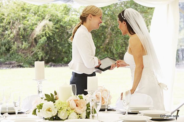 Bride With Wedding Planner In Marquee