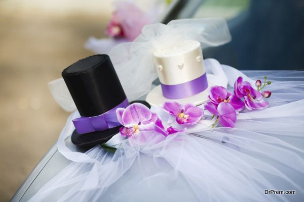 Wedding car decoration with two top hats