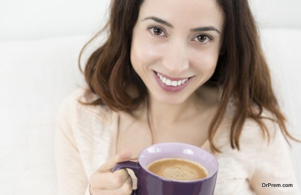Attractive woman enjoying her cup of coffee