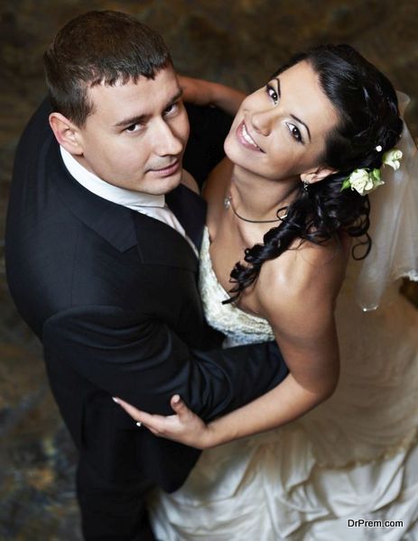 Romantic embrace bride and groom in wedding dance