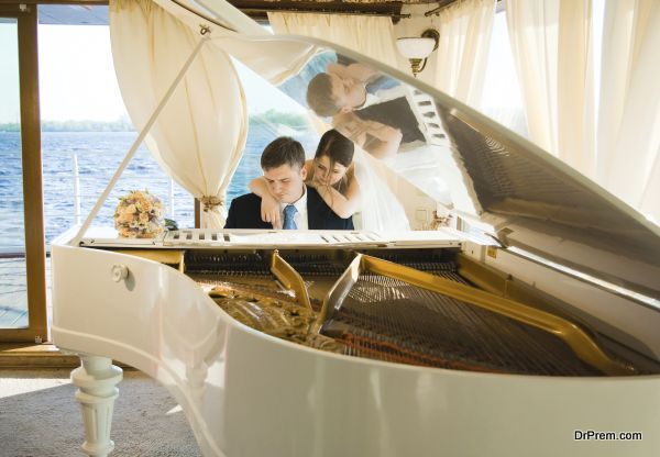 Bride and groom at the grand piano