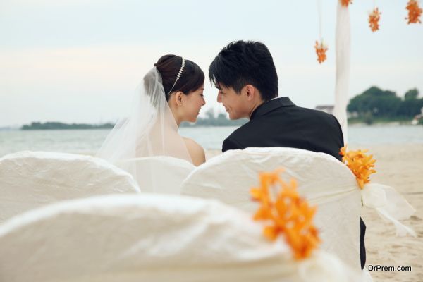 Ribbon-tied backdrop and chairs