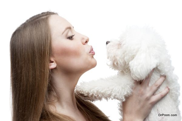 woman holding dog