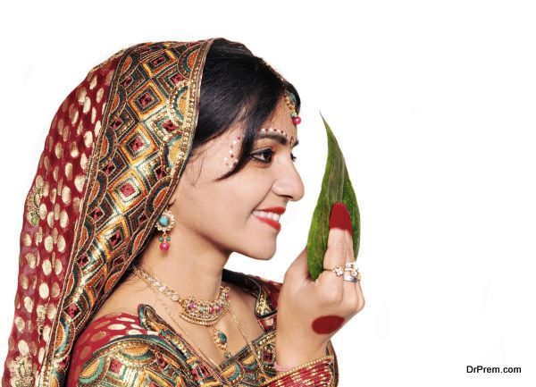 Side pose of a Bengali Indian bride on her wedding.